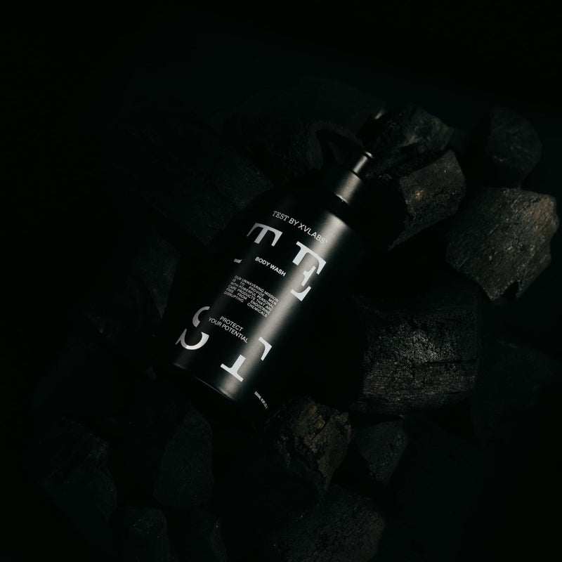 TEST BODY WASH on pieces of charcoal