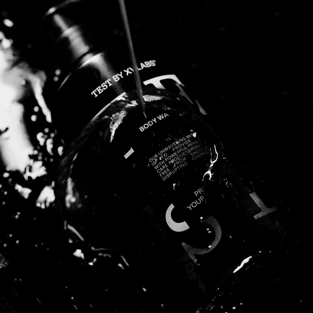 Pouring liquid on TEST BODY WASH